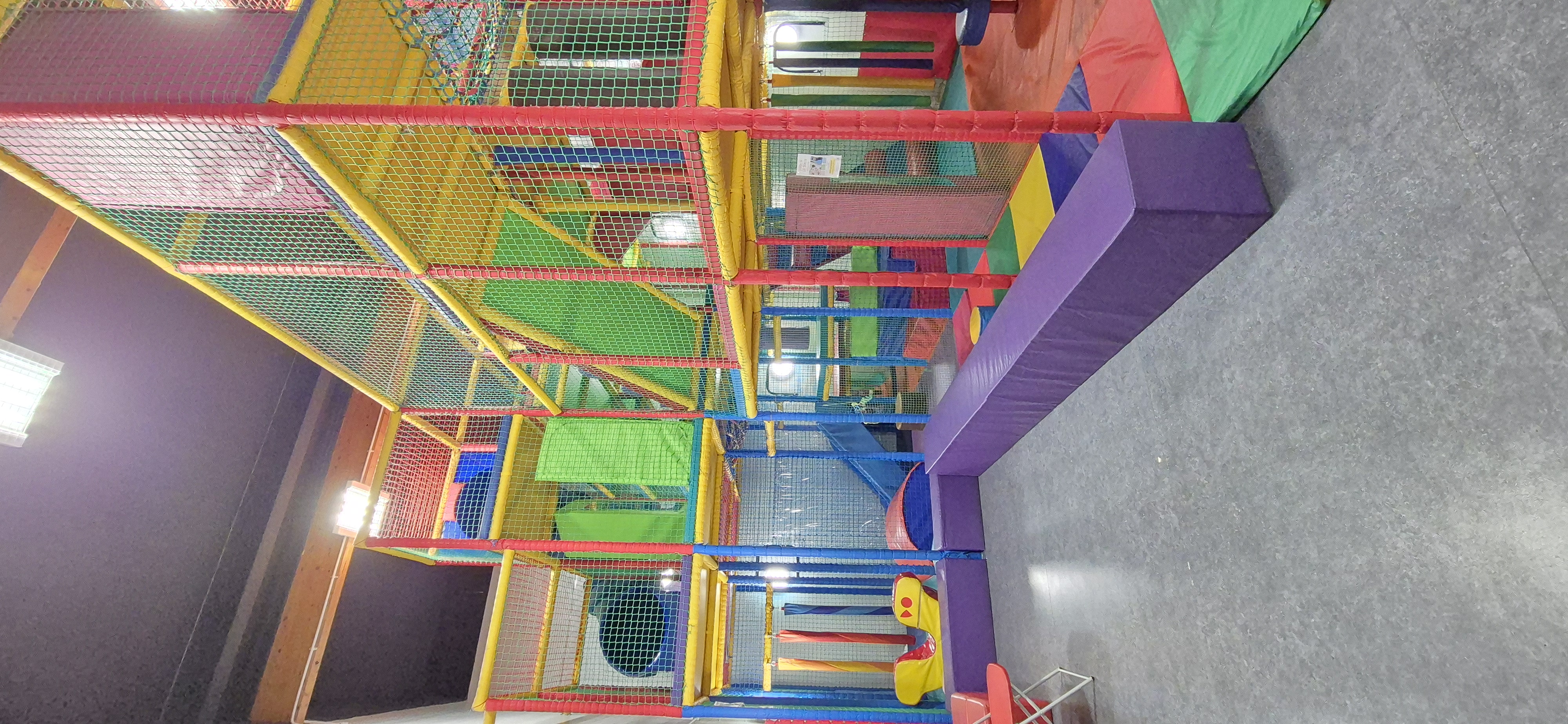 Soft Play at Whitburn Community Centre — large multi-level colourful indoor soft play structure with slides and climbing frames